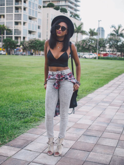 blackfashion:  Name: Ria Michelle Website: riamichelle.com | Instagram: @riamichelle Sunglasses: Wildfox Couture | Top: T by Alexander Wang | Jeans: Express | Boots: Alexander Wang   