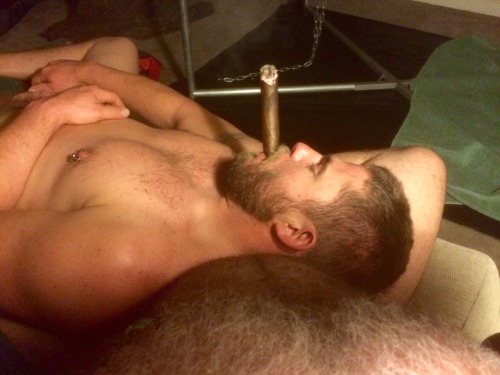 Smoking his cigar