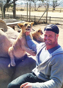 rwfan11:  Dolph Ziggler … trying to steal the show from that cute lion cub! :-) ……I think he won! 