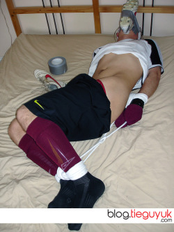 gaybondageboys:  tieguyuk: This str8 lad came from soccer practice in his dirty kit (to be fair I told him to). Hands in Mitts using another lads worn soccer socks, own boot taped to his gagged face str8 off his feet. And he got an instant hard on. 