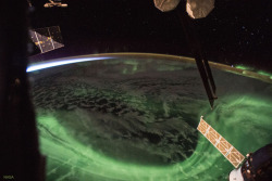 just&ndash;space:  The Aurora and the Sunrise  : On the International Space Station (ISS), you can only admire an aurora until the sun rises. Then the background Earth becomes too bright. Unfortunately, after sunset, the rapid orbit of the ISS around