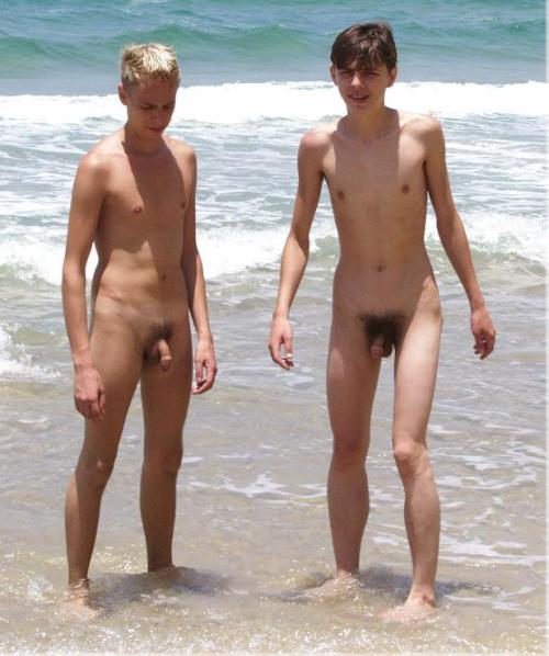 Naked boy at beach