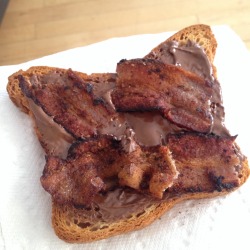 The tastiest breakfast thing I&rsquo;ve had in my mouth in a very long time.   Bacon and Nutella on GF toast. Fucking amazing.