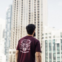 the-bearded-stag:  @croom12 enjoying the concrete jungle in our burgundy “always dapper” tee.  www.thebeardedstag.com #thebeardedstag   photo: @aleksandarjason