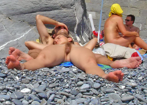 Naked girls on nude beach spread