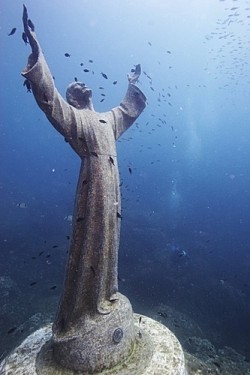 Blessings of peace (Christ of the Abyss, a bronze statue 17m underwater on the Italian Riviera; originally implanted in 1954)