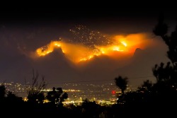 laughing-treees:  isolationary:  isolationary:  Uh, so, this is my town right now. And those are the mountains.   Just to clarify I don’t live in Hell even though it’s 106 degrees and fire is everywhere.  Wow 