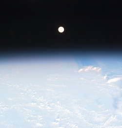 humanoidhistory: Earth and Moon, as seen from the Space Shuttle Discovery on December 22, 1999. (NASA)