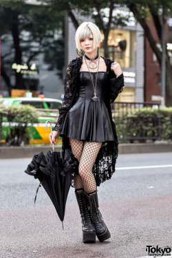 tokyo-fashion:  Averu on the street in Harajuku wearing a dark gothic look with a black lace jacket, faux leather mini dress, platform boots, a Vivienne Westwood backpack and Vivienne Westwood accessories. Full Look