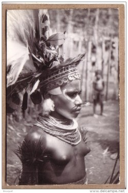 Papuan woman, via Delcampe.
