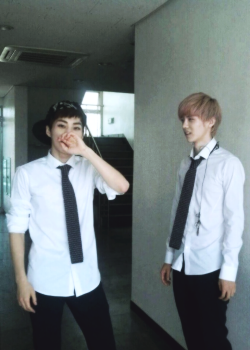 clear-and-master:  Am I the only one who looks at this picture and thinks Xiuhan just got caught kissing in the hallway? 