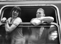 night-spell:   David Bowie and tour manager Pat Gibbons on the train prior to departing for Moscow from the Basel train station, 1976  ©   Andrew Kent,  sothebys.com  |  HQ  