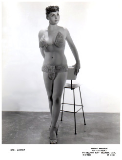 Doll ArdentManaged and represented by former showgirl Jewell White (aka. Flo Ash)..