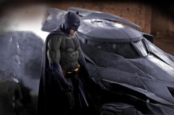 Ben Affleck in the new Batsuit, with the new Batmobile.   What do you think?     http://badlilmonkey.tumblr.com