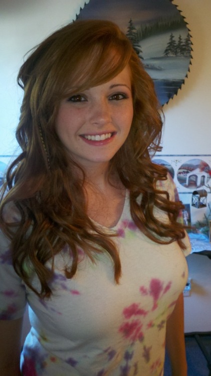 Cute teen girl redhead with freckles