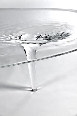 myampgoesto11:    Zaha Hadid: Liquid Glacial Table (2012) The Liquid Glacial design embeds surface complexity and refraction within a powerful fluid dynamic. The elementary geometry of the flat table top appears transformed from static to fluid by the