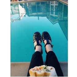 Chilling by the pool while we eating pork rolls @ckrystisk tenks hehe Such nice weather today #sun#fun#pretty#pool#ootd#instafood#yum#jellys#porkroll