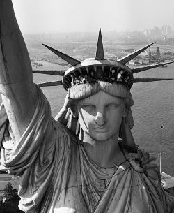 life:  Sightseers peering from the windows of the Statue of Liberty, 1951. (Margaret Bourke-White—The LIFE Picture Collection/Getty Images) #LIFEmagazine #StatueOfLiberty #1950s 