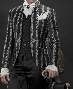 gothic-culture:  gothiccharmschool:  theblacklacedandy:  victorianstyle18:  Men Gothic Suit -Korean frock coat in silver and black brocade woven fabric, collar with rhinestones, combined with black satin trouser, black brocade period waistcoat Amadeus