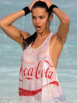 fuckyeahnakedcelebrities:  Adriana Lima naked boobs in wet t-shirt for Coca Cola  [NSFW]http://www.famousnakedcelebrities.com/models/adriana-lima-naked-boobs-in-wet-t-shirt-for-coca-cola/