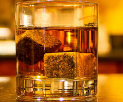 awesomeshityoucanbuy:  Whiskey Stones Say goodbye to watered down cocktails once and for all by cooling them with the whiskey stones. By adding a couple of these stones to your drink, you’ll be able to keep it icy cold for long periods of time without