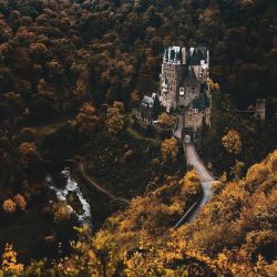 melodyandviolence:    Burg Eltz  by  Hannes Becker      (Eltz Castle is a medieval castle nestled in the hills above the Moselle River between Koblenz and Trier,Germany. It is still owned by a branch of the same family (the Eltz family) that lived there