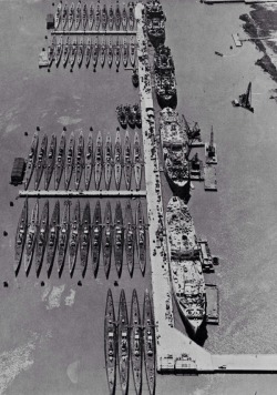 angrybell:  peerintothepast:The war is over and US forces are being demobilized back to peacetime status. Here, 52 submarines and 4 submarine tenders of the US Navy Reserve Fleet rest in Mare Island Naval Shipyard, California, Jan 1946. ww2db.com   Some
