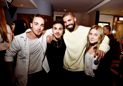 celebritiesofcolor:  Drake poses with ‘Degrassi’ co-stars Daniel Clark, Adamo Ruggiero and Lauren Collins at the screening of ‘We Are Disorderly’ held at the Royal Cinema on August 5, 2015 in Toronto, Canada.