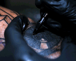 wetheurban:   ART: Slowmotion Tattoo In this incredible, hypnotizing slow motion, close-up, we see a tattoo being applied by tattoo artist GueT. Seeing the skin ripple in super slow motion is both remarkable and slightly unsettling. Read More