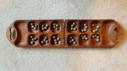 thoughtsofafallenpharoah:technicallyretarded:  vulcanwifi:  tontonmichel:  nicknamenyquil:  raelasoull:  alaayemore:AYO OLOPON. Ayo is a traditional Yoruba board game, however It is widely played throughout West Africa and the Caribbean. Among its many