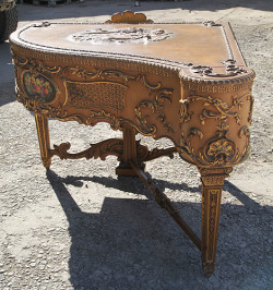 besbrodepianos:  An extrememly rare, Claviano grand piano built for songwriter and film star Ivor Novello. This piano has an ornately carved, rococo style case with gilt accents. The piano spans five and a half octaves and has been strung using bi-chords