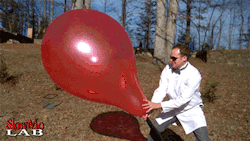 kranxa:chibi-masshuu:fencehopping:Giant balloon popping in slow motion.  Blood bending is real.  That is wicked cool