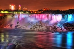 sixpenceee:Niagara Falls Illumination  Every evening beginning at dusk, the Falls are lit in the colours of the rainbow. Illumination of the Falls has been financed and operated by The Niagara Falls Illumination Board since 1925  It&rsquo;s very peaceful