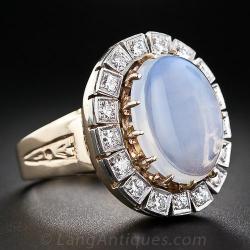 thejewelryvault:  Creator: Unknown, circa 1930-40s Stone(s): Blue Flash Moonstone, Diamond Metal: White and Yellow Gold Source: Lang Antiques 