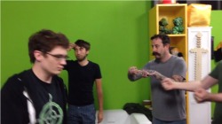 ponweiponfarr:  swaggermimint:  tinybatfan:  somebody who doesnt watch achievement hunter look at this picture and tell me what’s going on  The two men to the right are attempting to get into fisticuffs with the gentleman to the left with the glasses.