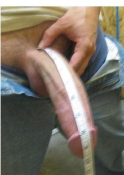 manx10:  damn…sorry…i meant to send this pic of my tape measure along side the top side of my shaft. as u can see I am not completely erect but the tape measure does show 10 inches. thought u’d like some verification of my 11 inch cock