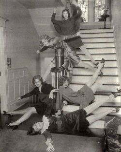 Girls having fun on stairs, ca. 1920s.