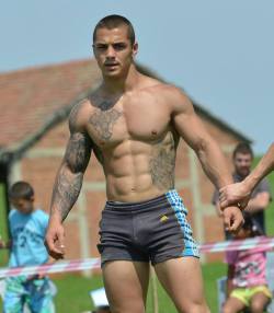 guystease:  Hottest Bulgarian wrestler ever.  Is he a supermodel with a huge bulge or just a beautiful wrestler with hot tattoos? 