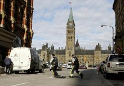 yahoonewsphotos:  Multiple shootings in Ottawa Ottawa police say they are investigating three shooting incidents in Ottawa, including inside parliament buildings, at the War Memorial, and inside the Rideau Centre Mall. A uniformed Canadian soldier has