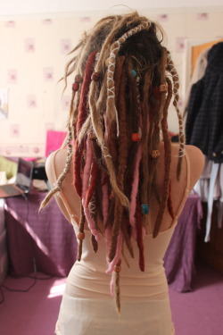 significance-unknown:  dreadlockinfo:  My names Amy and my locks are about 6 months old :D I used twist and rip method xhttp://dreadedlockz.tumblr.com/  gorgeous I love when dreads anre mixed up with different beads and colors