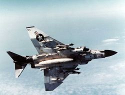 010371350:  vietnamwarera:  A US Navy McDonnell Douglas F-4J Phantom II  equipped with Sidewinder and Sparrow missiles. The particular aircraft pictured was hit by a North Vietnamese SAM and the crew ejected over the Gulf of Tonkin in 1972.  my grandpa