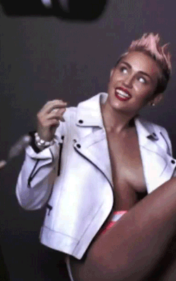 nude-celebz:  Miley nip slip GIF