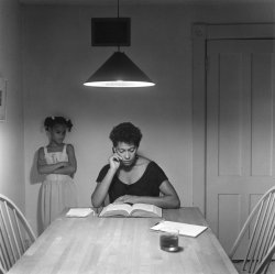  &ldquo;The Kitchen Table Series” (1990), a photographic investigation of a single domestic space in which the artist staged scenes of “the battle around the family” between women and men, friends and lovers, parents and children. Carrie Mae Weems