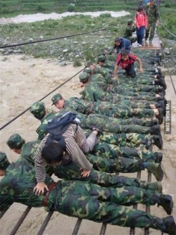 natal-ee-a:  Faith in humanity restored: Mexican soldiers serving as a bridge to save people from recent floods.
