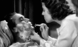 charlesfarrells:  Janet Gaynor gives a shave to a bed-ridden Charles Farrell in Change Of Heart (1934) 