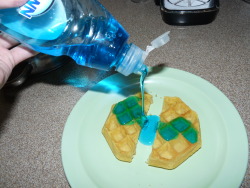 man, what the fuck is the point in putting dish washing liquid on a waffle. like what is the point in wasting food and soap? what is the purpose of this picture. and i dont want to hear shit about contrast or juxtaposition or eclectic or esoteric or any