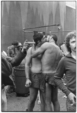 fyeah-history:  A couple kissing in a crowd at the ‘Gay Motorcycle Rally’, San Francisco, 1975 