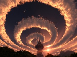aquariz:  waakeme-up:  reckless-fires:  wasbella102:  Cloud spiral in the sky. An Iridescent (Rainbow) Cloud in Himalaya. The phenomenon was observed early am 18 Oct 2009  This is amazing  I would just about die of happiness  Wowww 