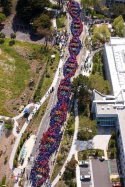 kiinkykitten:  altnonfic:  Feb 28, 2013 - By wearing different colored hats, over 2,600 employees at Genentech (in San Francisco) celebrated the 60th anniversary of the discovery of DNA   So cool