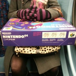 kamalrb:  So this oldish white woman is sitting across from me on the bus with this #fresh looking #nintendo64 #japanese #box, looked #sick. #nintendo#64#n64#retro#vintage#gaming#games#console#japan#jap#bus#public#transport#creepin (at Elgin crescent)